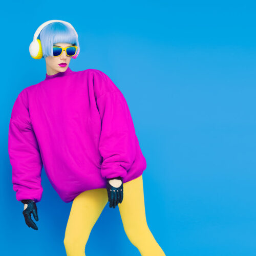 glamorous-fashion-lady-in-bright-clothes-listening-2024-09-17-21-27-08-utc