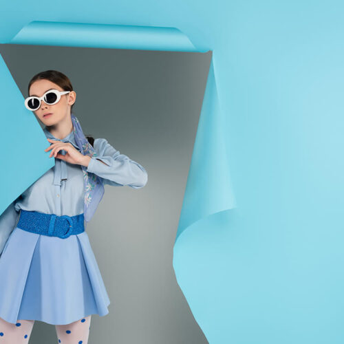 young-fashionable-woman-in-sunglasses-near-hole-in-2023-11-27-05-23-04-utc