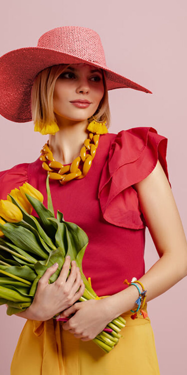 attractive-young-woman-in-elegant-hat-holding-bunc-2023-11-27-05-01-36-utc attractive-young-woman-in-elegant-hat-holding-bunc-2023-11-27-05-01-36-utc