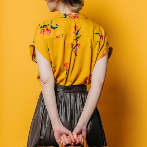 back-side-view-on-stylish-blond-hair-woman-in-hat-2024-09-25-23-09-29-utc