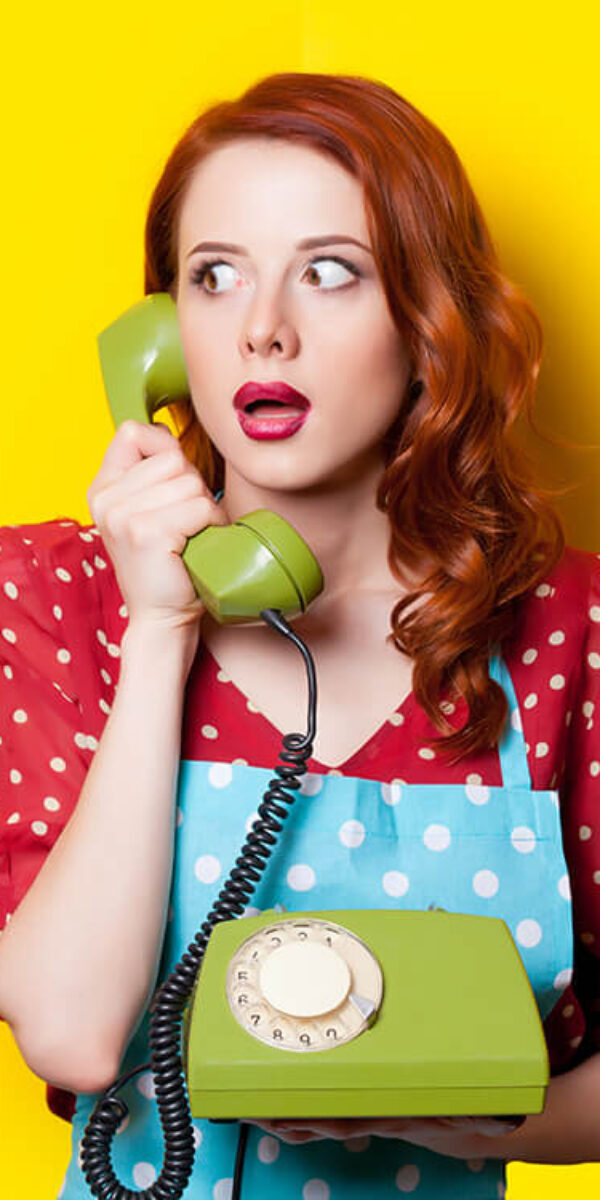 beautiful-surprised-young-woman-with-retro-phone-o-2024-09-25-07-11-11-utc