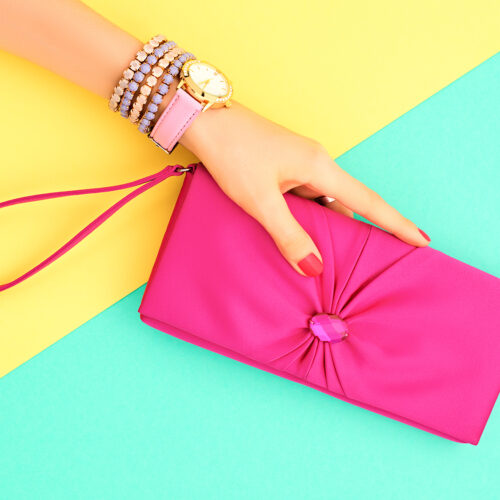 Fashion. Clothes Accessories fashion Set. Female hand Stylish Trendy Handbag clutch, Glamor Wrist Watches. Summer fashion girl Outfit, Luxury Party accessories.Hipster Essentials.Minimal fashion style