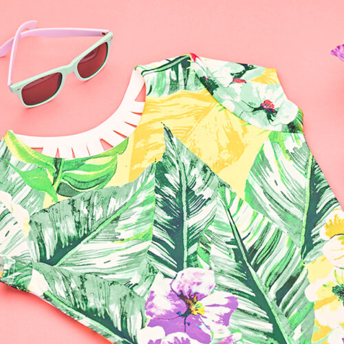 Fashion Summer Glamor Accessories minimal look. Woman stylish clothes collection falling on pastel apricot background. Trendy fashionable layout. Fashion advertising, top view.