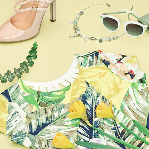 Fashion Summer Glamor Accessories minimal look. Woman stylish clothes collection falling on pastel mint background. Trendy fashionable layout. Fashion advertising, top view.