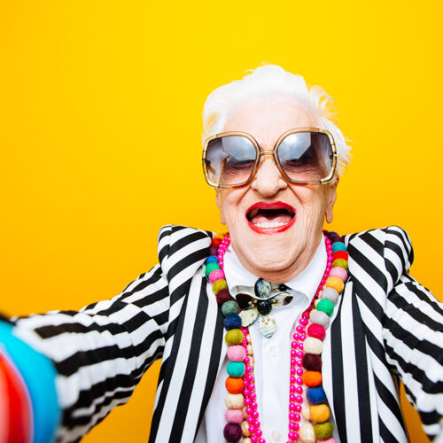 Funny grandmother portraits. Senior old woman dressing elegant for a special event. granny fashion model on colored backgrounds