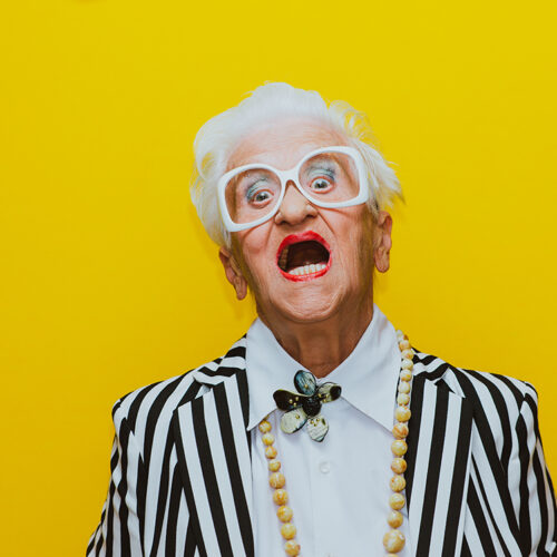 Funny grandmother portraits. Senior old woman dressing elegant for a special event. granny fashion model on colored backgrounds