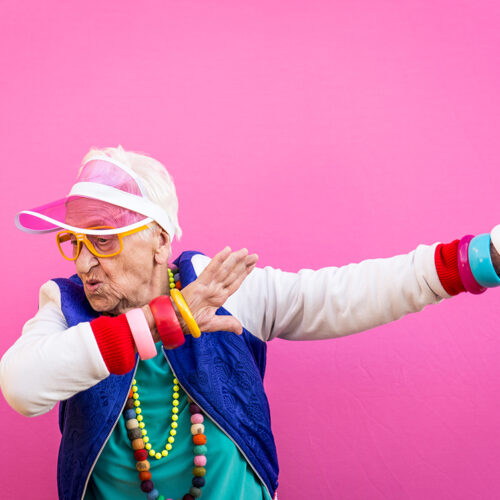 funny portraits with old grandmother Funny grandmother portraits. 80s style outfit. Dab dance on colored backgrounds. Concept about seniority and old people