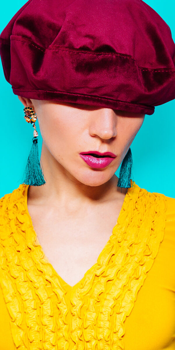 Model in fashion accessory beret and jewelery Vintage dress Model in fashion accessory beret and jewelery Vintage dress