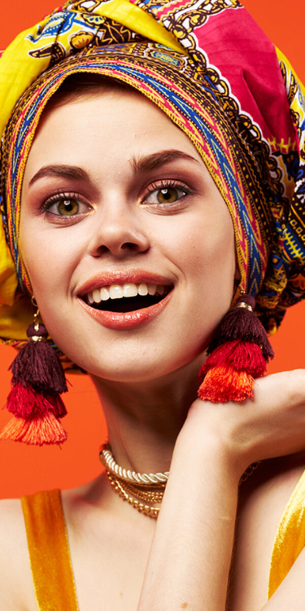 pretty woman in multicolored turban attractive look Jewelry Studio Model. High quality photo