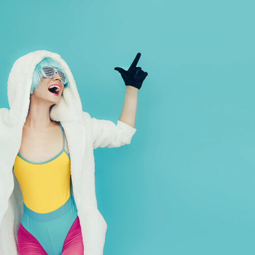 screaming-crazy-girl-in-hoodie-on-a-blue-backgroun-2024-09-18-16-37-35-utc