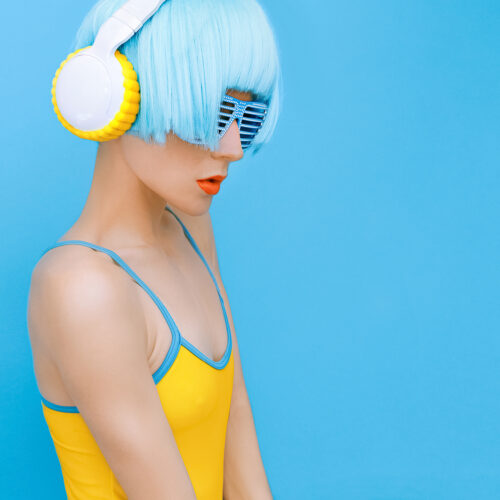 sensual DJ-lady in style headphones listening to music sensual DJ-lady in style headphones listening to music