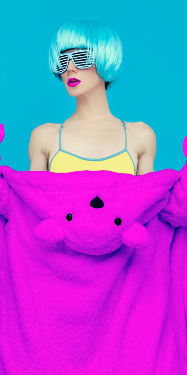 teddy bear girl on a blue background. Crazy winter party. Club dance style